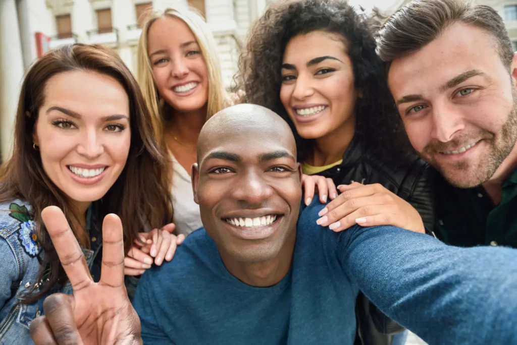 Multiracial group young people taking selfie